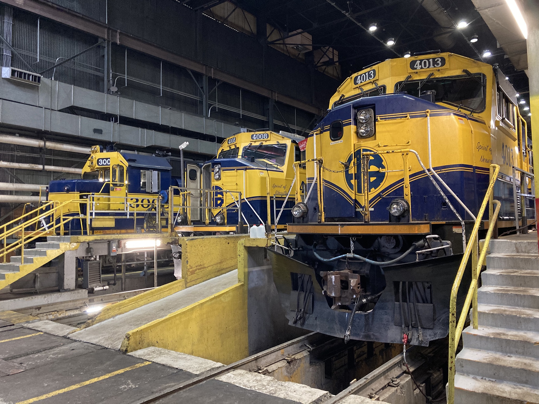 Locomotives in the Anchorage diesel shop, Febraury 2021.